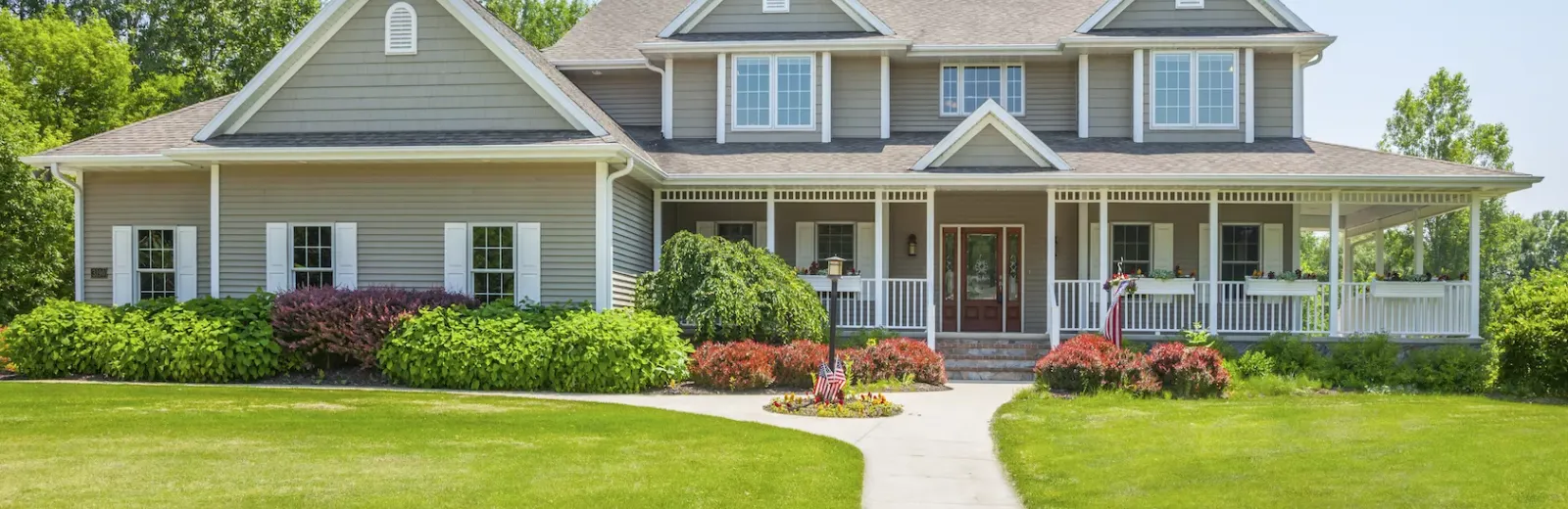 House with lush, healthy, green lawn